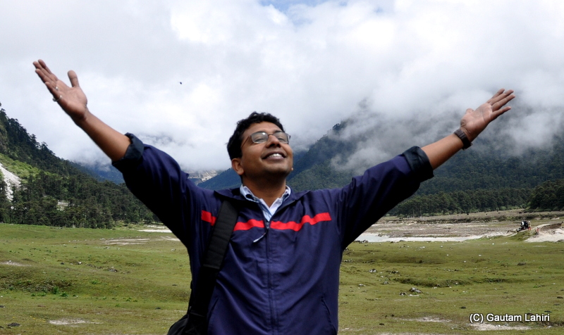 A bow to the universe for love and care I share at yumthang valley with cars by gautam lahiri