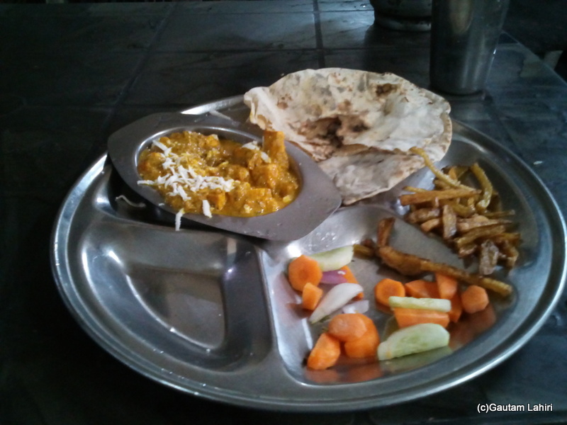 At Gaya, A vegetarian dinner that I had ordered when the bus stopped. It comprised of handmade bread, a mixed salad of carrots, cucumber, a big spoon filling crispy potato slices, and shahi paneer, incredibly tasty at Gaya by Gautam Lahiri
