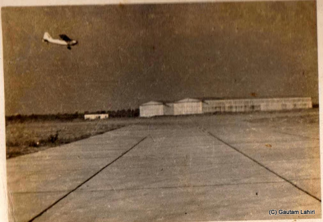 Piper makes its descend as she approaches to land, Krishnan pushes the stick forward to dip the nose. Seen here as one of the ground staff took the snap years ago as a memento for my father at Nagpur, India by Gautam Lahiri