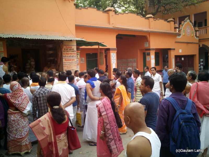 At Gaya, With every passing minute, the crowd started increasing, a section of the people was lead off to the other side on to the waiting auto rickshaws for the next step by Gautam Lahiri