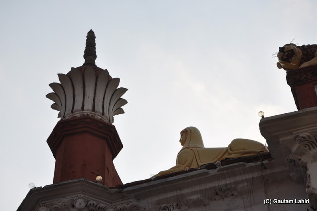An interesting design mix atop the entrance..minarets and a shape looking quite similar to Blue Amenhotep III Sphinx Egyptian figure adorned the rooftop at Krishnanagar, West Bengal, India by Gautam Lahiri
