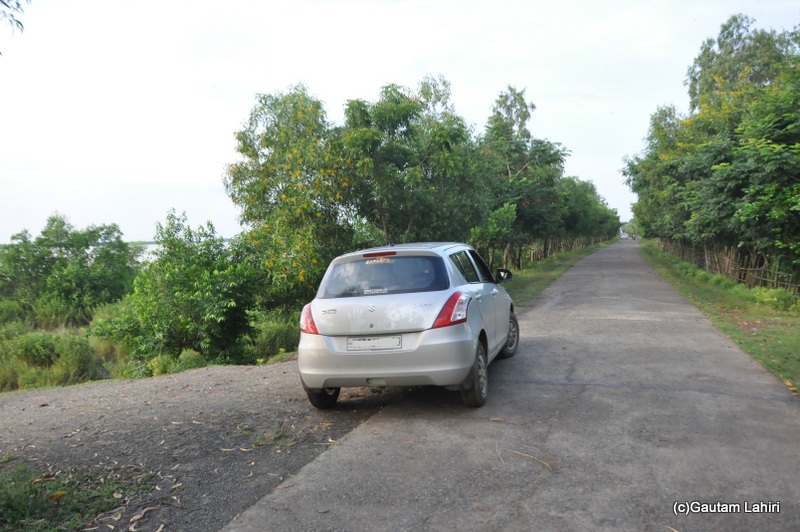 Our car, Swift parked beside the crocodile infested Brahmani river taken Gautam Lahiri