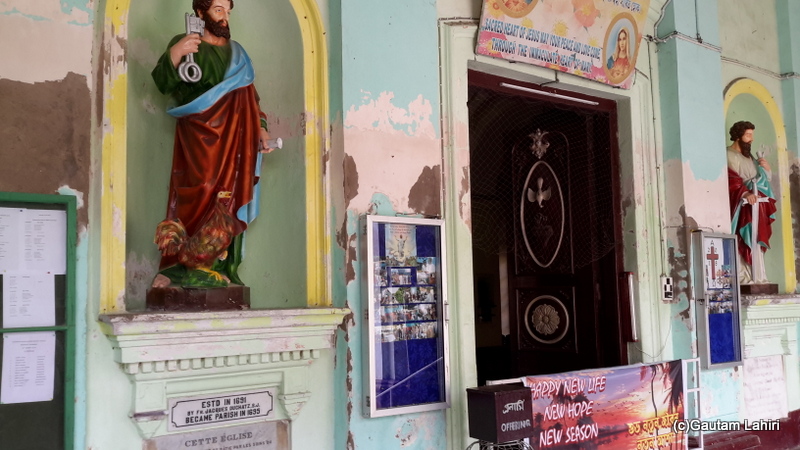 The Church entrance has a very beautifully decorated huge wooden door in Chandannagar by Gautam Lahiri