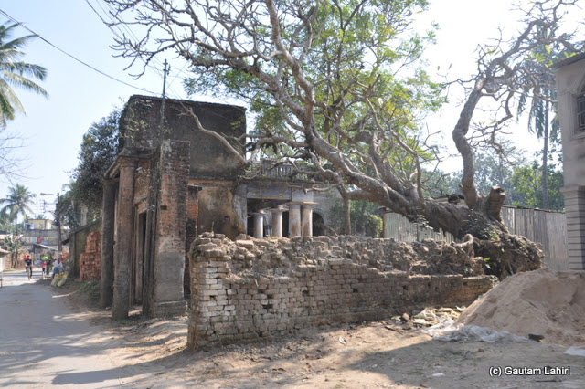 Old houses stared at us as we made our way through the town in Purbasthali by Gautam Lahiri