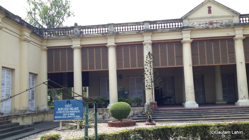 The Dupleix Palace stands defiantly among the other buildings around in Chandannagar by Gautam Lahiri