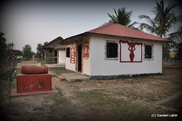 Another tribal cottage styled beautifully that one can seriously believe that a group of villagers with bows and arrows will rush out to greet you  at Santiniketan, West Bengal, India by Gautam Lahiri