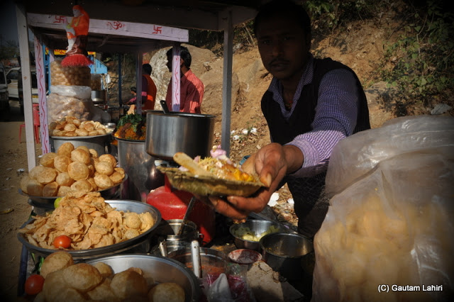 Mouth watering 'chaat' comes straight at you as the tongue awaits to smack them clean  at Massanjore, Jharkhand, India by Gautam Lahiri