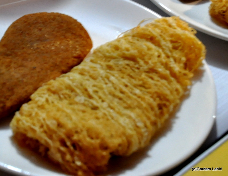 A oil soaked Chicken cutlet, along side the famed Mutton cutlet. We tasted both to quell the hunger at Chandannagar by Gautam Lahiri