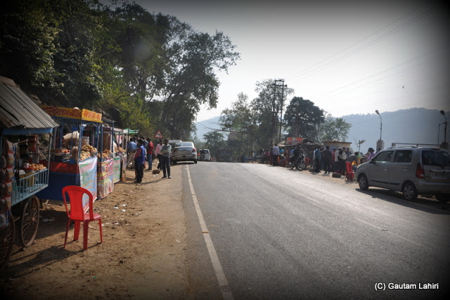 The food stalls that border the road across the dam and make your salivary gland very active  at Massanjore, Jharkhand, India by Gautam Lahiri