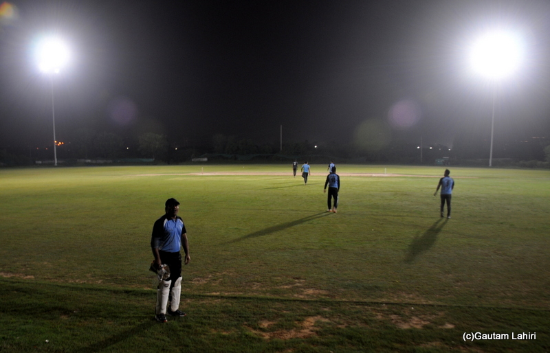 Cricket match fielders arranging at field positions by Gautam Lahiri