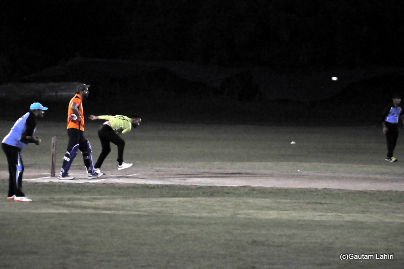 Cricket bowler delivers the ball by Gautam Lahiri