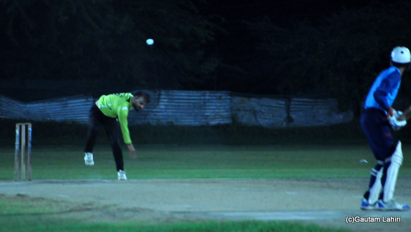 Cricket bowler delivers the ball by Gautam Lahiri