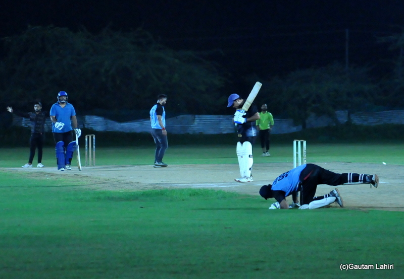 The cricket wicket keeper stops the rushing ball by Gautam Lahiri