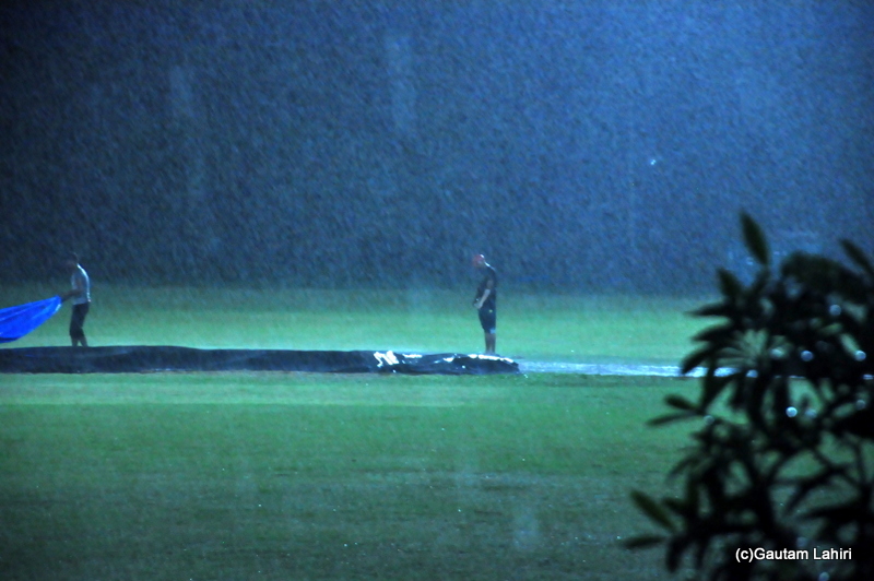 Cricket match stops, as rains deluge the cricket ground by Gautam Lahiri