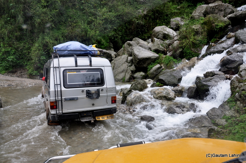 These are not roads but rocky outcrops washed by hilly streams. We drove cutting the water