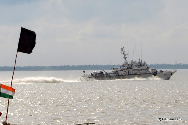 The Ganges river, wide and slow moving at Diamond Harbor, West Bengal, India before meeting the Bay of Bengal by Gautam Lahiri