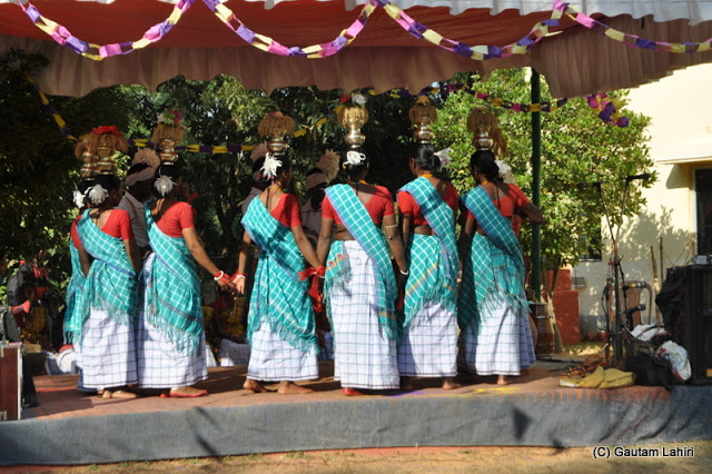 Tribal women happily dancing on the stage  at Santiniketan, West Bengal, India by Gautam Lahiri