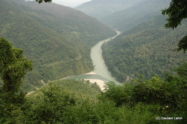 The confluence of Teesta river and Rangeet river, The spot from where we took this snap was picture perfect. Two rivers meandering through the dense jungles over the hills. All you can hear is the distant roar of the rivers and sound of the wind  at Darjeeling, West Bengal, India by Gautam Lahiri