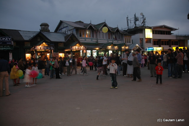The Mall in Darjeeling, where tourist flock to spend the evening  at Darjeeling, West Bengal, India by Gautam Lahiri
