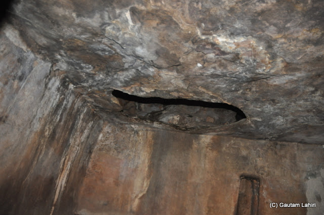 A cave with an opening in the rock bed to circulate cool air to both the floors was created for the comfort of the Jain monks.. an example of ancient air conditioning  at Bhubaneshwar, Odissa, India by Gautam Lahiri