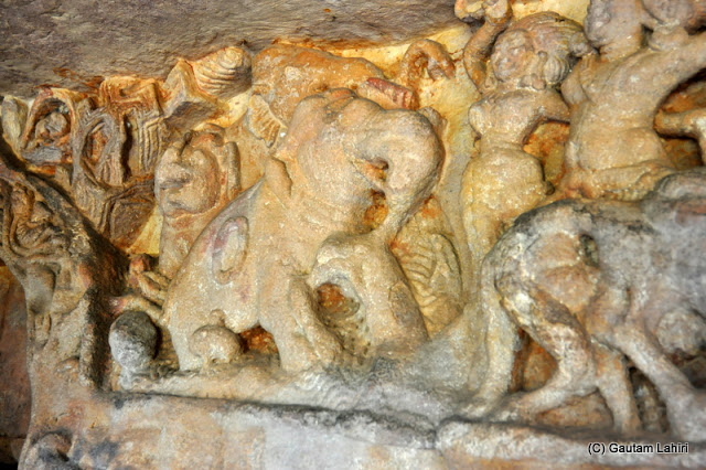 Elephant carvings on the rock face in one of the chambers  at Bhubaneshwar, Odissa, India by Gautam Lahiri