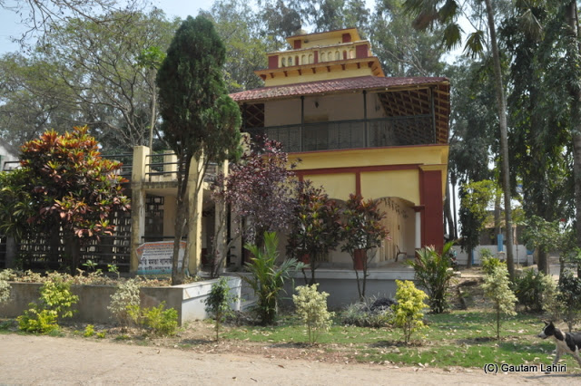 The old building looked gallant in its wrought iron veranda and mud-baked tiles which acted like a sun shade. All I wanted to do was to take an easy chair, get in, prop my legs on a stool and read a book and eventually fall asleep under the river breeze's care at Gadiara, Hooghly, West Bengal, India by Gautam Lahiri