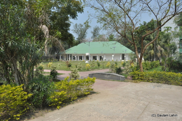 Nicely manicured lawns and an outhouse adorned the riverside Rupsali complex at Gadiara, Hooghly, West Bengal, India by Gautam Lahiri