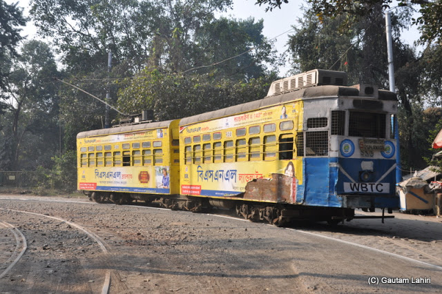 A Calcutta Tramways tram taking a turn at Esplanade, Kolkata, West Bengal, India by Gautam Lahiri
