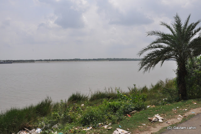 Ichamati river flows on with so much of memories that she carries from both the countries she touches at Taki, West Bengal, India by Gautam Lahiri 