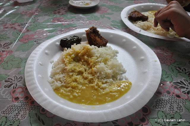 White rice, lentils, a slice of Rohu fish and Brinjal (eggplant) fry and they were so delicious at Taki, West Bengal, India by Gautam Lahiri