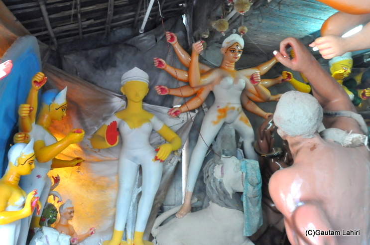 At various stages of the idol build out, at Kumartoli, North Kolkata by gautam lahiri