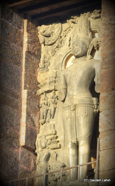 Late afternoon sun dazzling the face of the Surya god made of chlorite rock  at Puri, Odisha, India by Gautam Lahiri