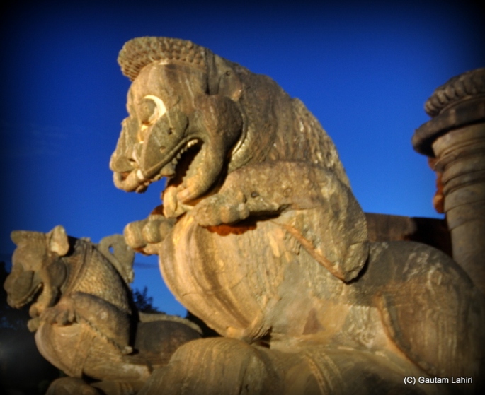 Simha gaja, at the entrance of the temple where the lion is crushing the elephant underneath  at Puri, Odisha, India by Gautam Lahiri