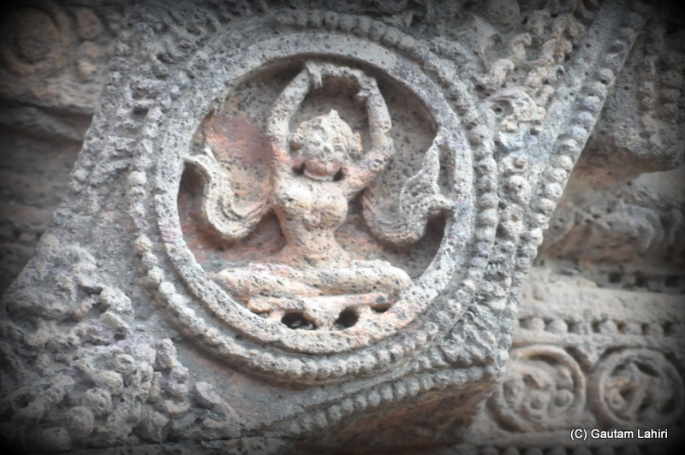 The big chariot wheel has smaller circles having carving of a lady, like here - getting up from bed, so the position of this circle is around the early morning of a typical day and the time can be calculated sometime in the morning  at Puri, Odisha, India by Gautam Lahiri