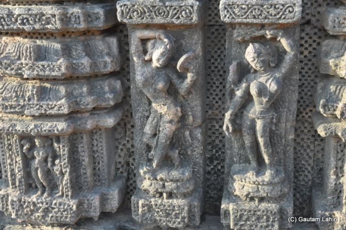 The lady on the left is looking herself in the mirror while applying vermilion on her head, which meant the know-how to make mirrors was predominant in those days  at Puri, Odisha, India by Gautam Lahiri