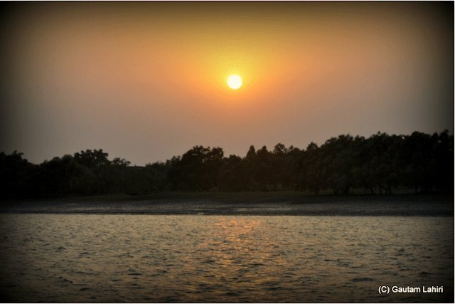 sunset at the sunderbans, west bengal, india by gautam lahiri
