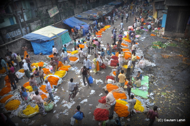 The Howrah bridge flower market, an aerial view atop the bridge  at Kolkata, West Bengal, India by Gautam Lahiri