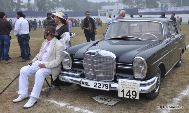 1967 Mercedes Benz 230S, with her proud owner, waits for the rally marshal to turn her 2.3 Litre motor  at Kolkata, West Bengal, India by Gautam Lahiri