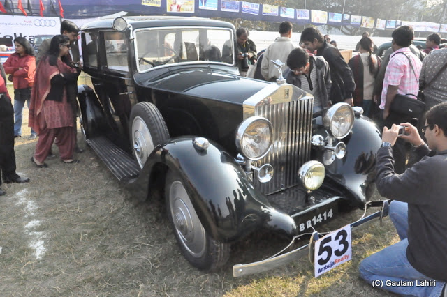 The black 1938 Rolls Royce Wraith 4.2 liters, 6 cylinders looked incredibly beautiful in the morning sunrise  at Kolkata, West Bengal, India by Gautam Lahiri