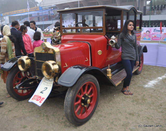 A 1912 Coventry having 20 HP, and 4 cylinders wait to be fired up. Everyone wants to pose with her  at Kolkata, West Bengal, India by Gautam Lahiri