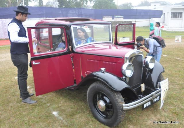 Family fully dressed to start the rally in this 1933 Austin using her 7 HP 4 cylinders engine  at Kolkata, West Bengal, India by Gautam Lahiri