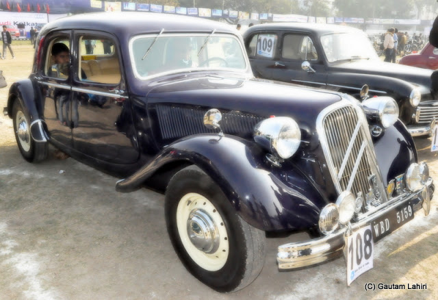 Polished clean, this 1952 Citroen 15 pulled a huge crowd and engine note was almost that of a leopard, ready to leap, this car was famous for its traction avant monocoque design  at Kolkata, West Bengal, India by Gautam Lahiri
