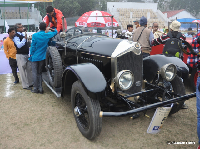 A gleaming, midnight black 1922 Crossley 25 HP, 4 cylinders is being readied for the rally  at Kolkata, West Bengal, India by Gautam Lahiri