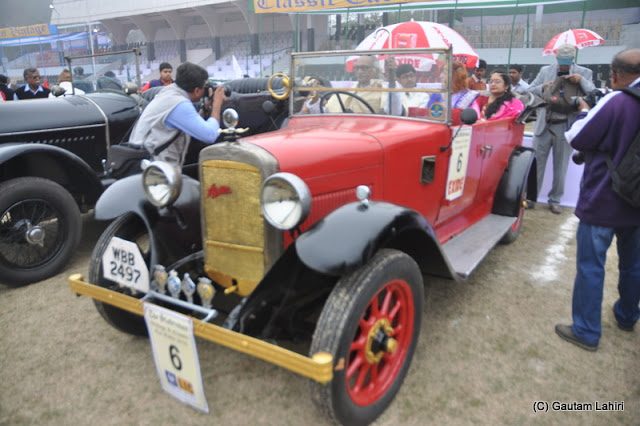 A 1922 Austin is all set to take its passengers effortlessly with its 12 HP, 4 cylinder engine  at Kolkata, West Bengal, India by Gautam Lahiri