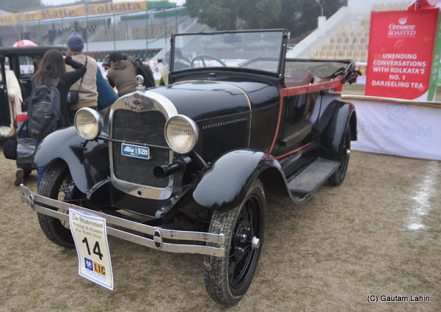 Red strip on black 1928 Ford, 12 HP, 4 cylinders parked beside the podium awaits inspection  at Kolkata, West Bengal, India by Gautam Lahiri