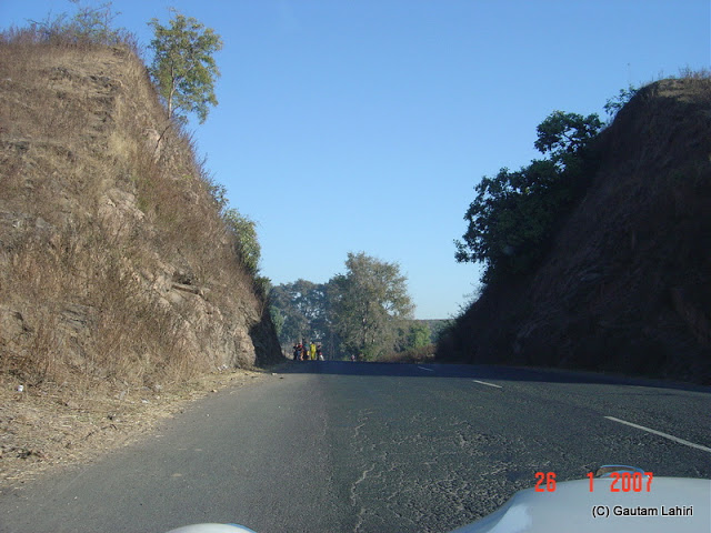 The hill sliced with a cleaver for the motorists to have a singular experience of the road to Kanha from Nagpur by Gautam Lahiri