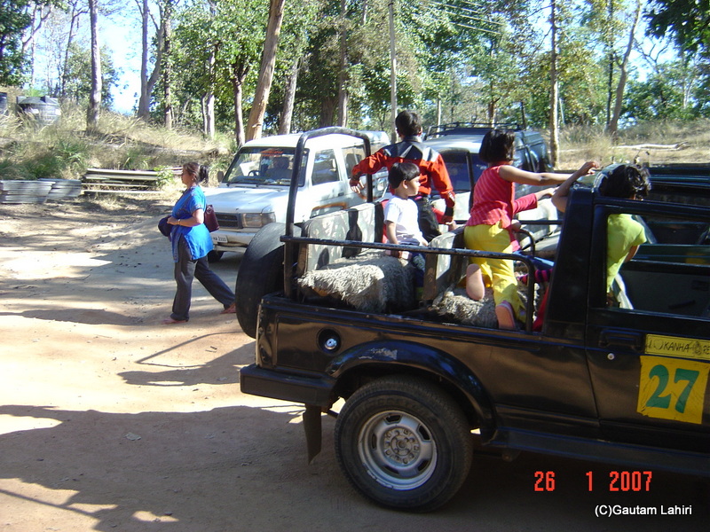 We set off with people and vehicles in search of the wild animals of Kanha forest by Gautam Lahiri