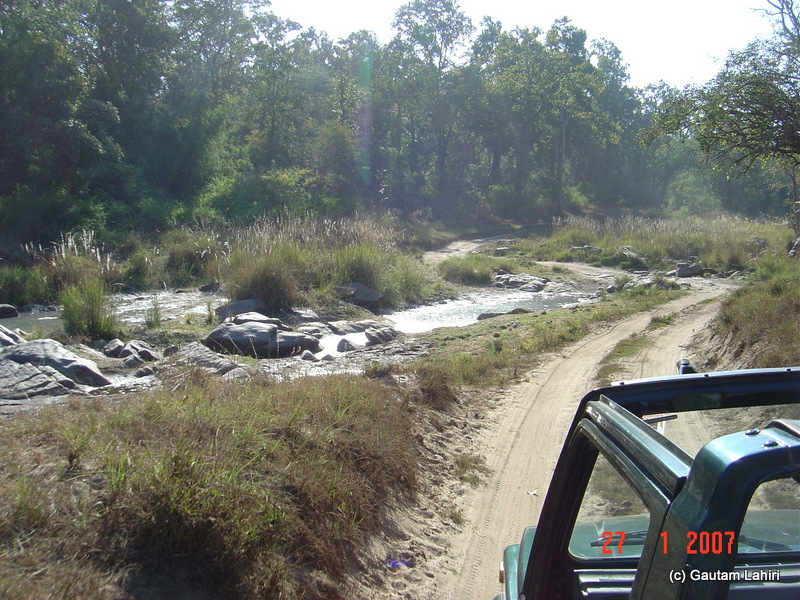 The Gypsy hugged the stream bordered dirt track, only to enter another hairpin bend and an incline at Kanha forest by Gautam Lahiri