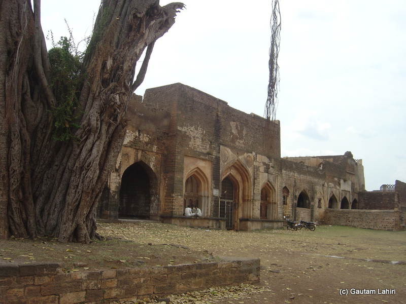 Front face of the Tarkash Mahal, the walls that had protected the privacy of the Turkish wives now lay mute and still try to tell the history to the visitors with silence at Bidar fort by Gautam Lahiri