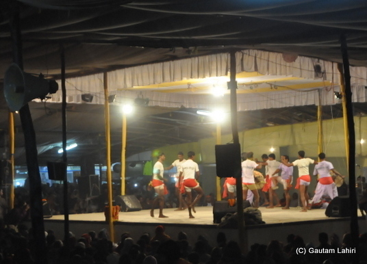 Tribal dance in full wing at poush mela at Santiniketan, West Bengal, India by Gautam Lahiri